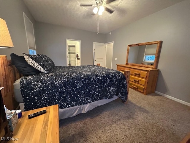 bedroom with carpet floors and a textured ceiling