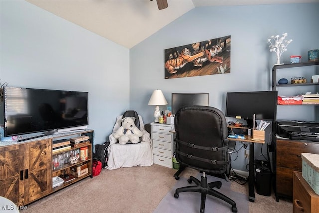 home office with vaulted ceiling and carpet