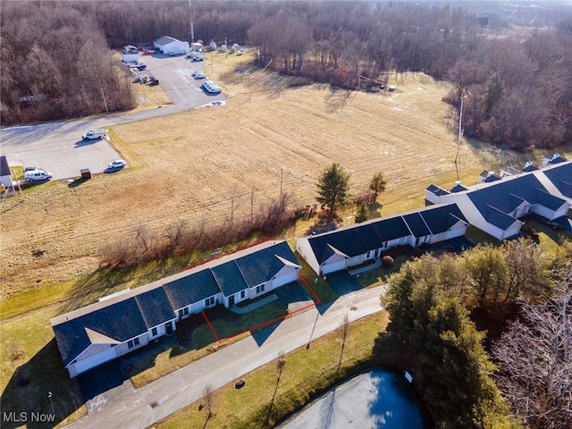 birds eye view of property featuring a rural view