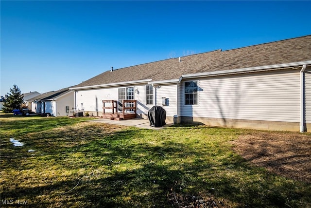 back of house with cooling unit, a patio area, and a lawn