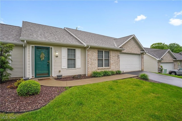 9278 Woodworth Rd Unit 1801, North Lima, OH 44452 - ranch-style home featuring an attached garage, driveway, a front lawn, and roof with shingles