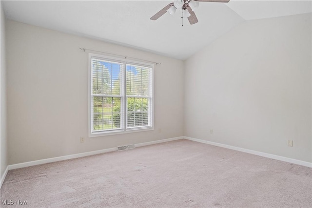 9278 Woodworth Rd Unit 1801, North Lima, OH 44452 - unfurnished room with lofted ceiling, light carpet, a ceiling fan, and baseboards