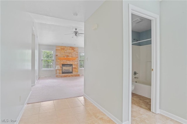 9278 Woodworth Rd Unit 1801, North Lima, OH 44452 - hallway featuring light carpet, light tile patterned flooring, and baseboards