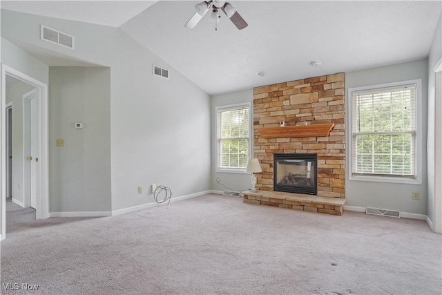 9278 Woodworth Rd Unit 1801, North Lima, OH 44452 - unfurnished living room featuring lofted ceiling, carpet floors, a ceiling fan, a fireplace, and baseboards