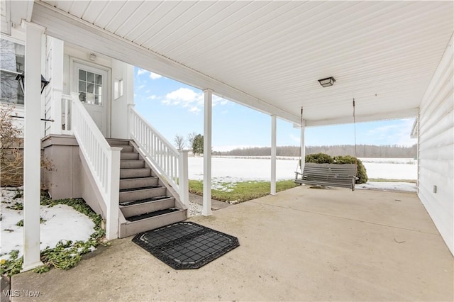 view of patio / terrace featuring a water view