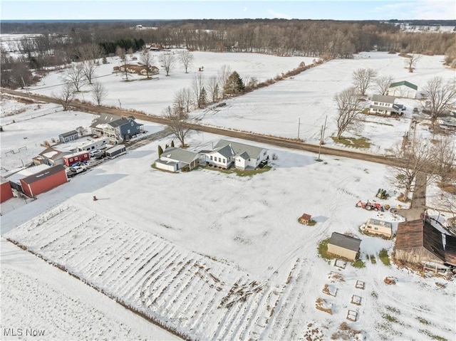 snowy aerial view with a rural view