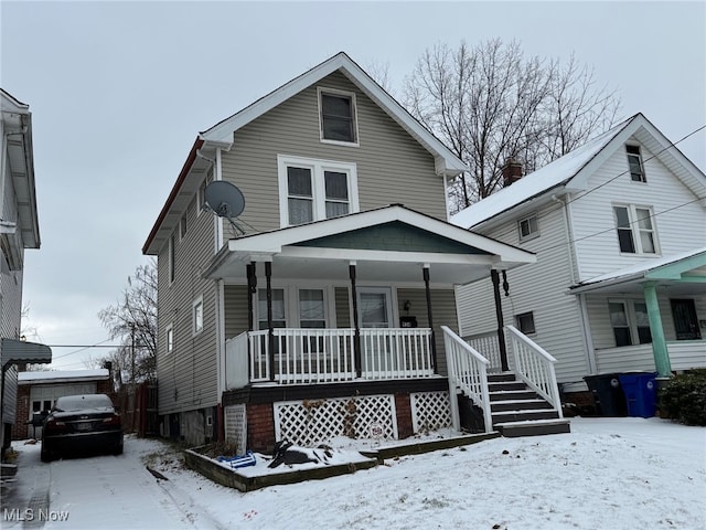 front facade featuring covered porch