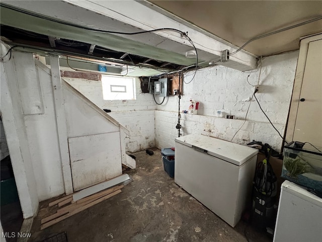 basement with fridge