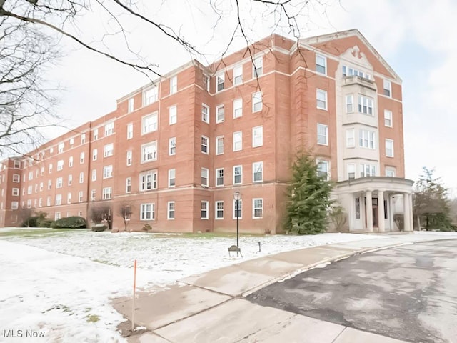 view of snow covered property