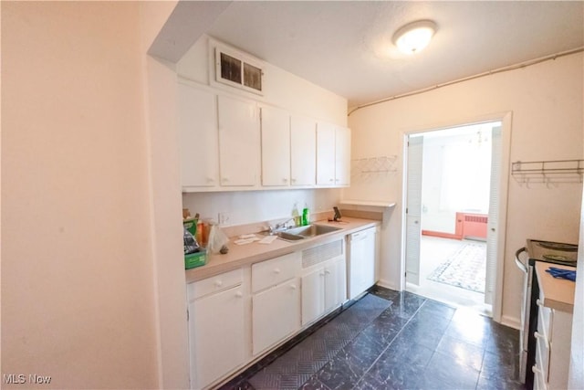 kitchen with stainless steel electric range oven, dishwasher, sink, and white cabinets