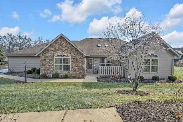 single story home with a front yard