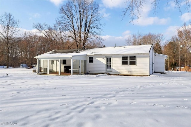 view of snow covered property