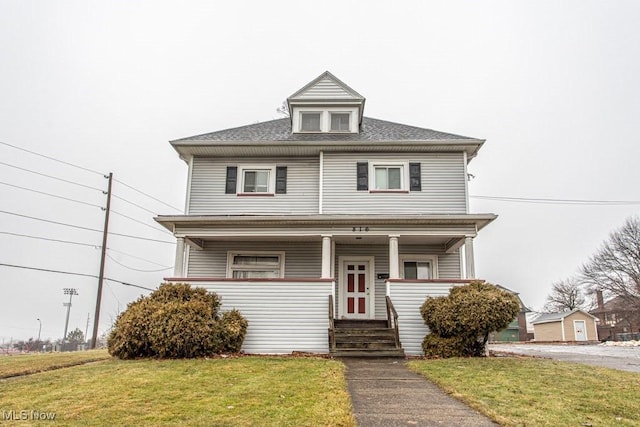 view of front of property with a front lawn