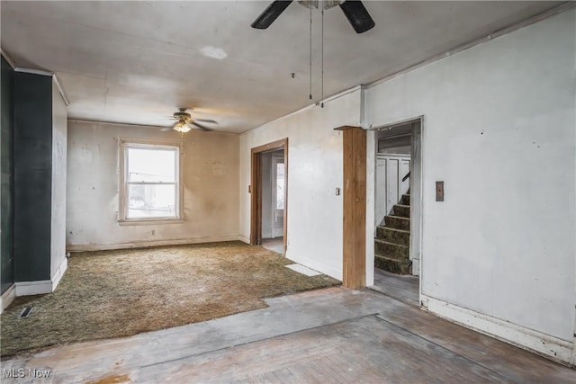 spare room with ceiling fan