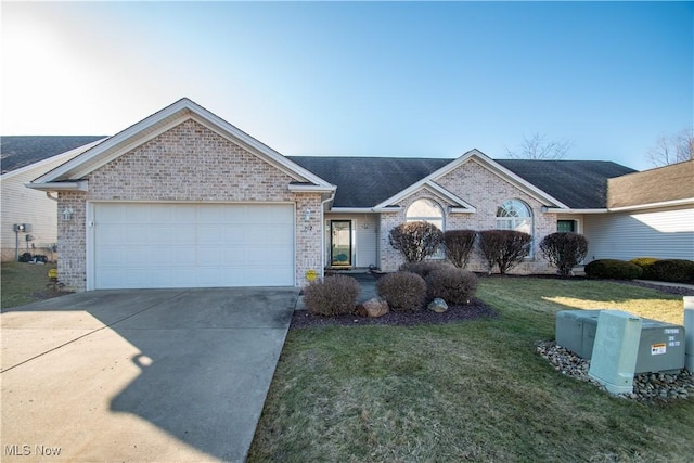 single story home with a garage and a front yard