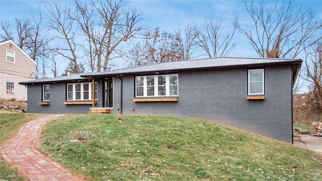 view of front of home with a front yard