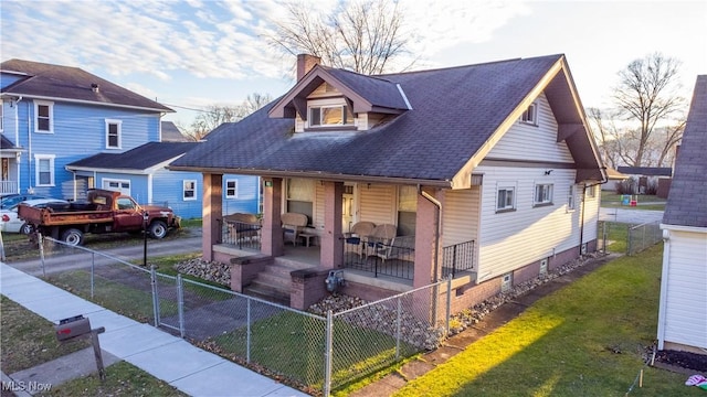 view of front of property with a front lawn and a porch