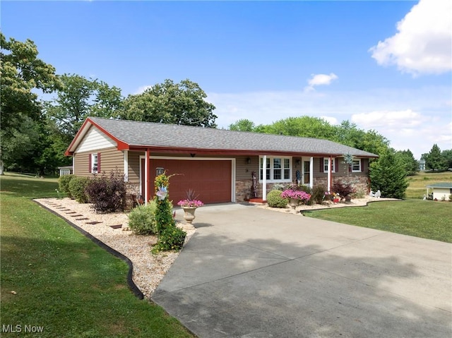 single story home featuring a garage and a front lawn