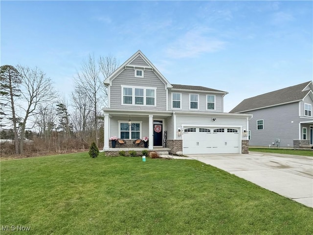 craftsman inspired home featuring a garage, a front lawn, and a porch