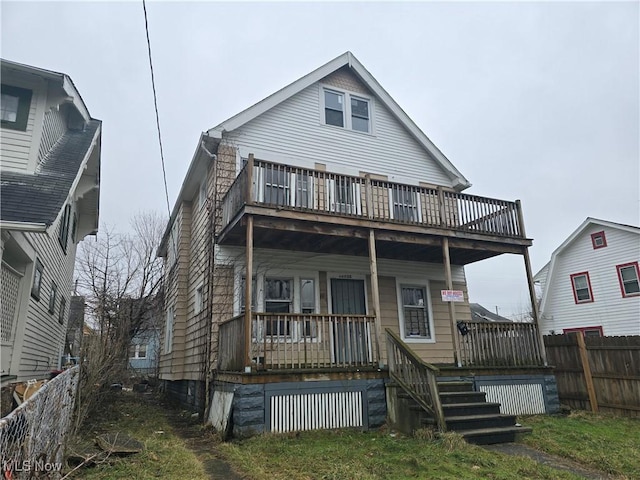 rear view of house with a porch