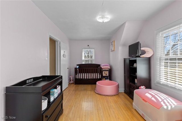 bedroom featuring light wood-type flooring