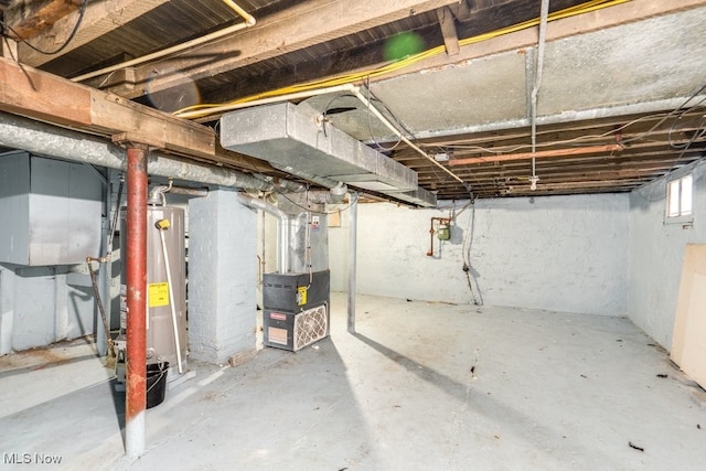 basement with heating unit and gas water heater