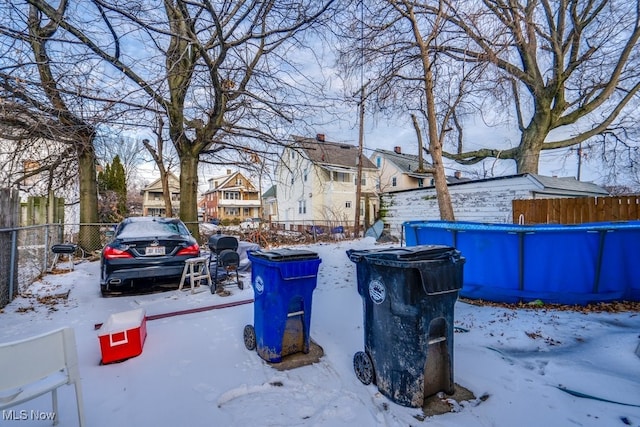 view of yard covered in snow