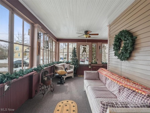 sunroom / solarium with ceiling fan