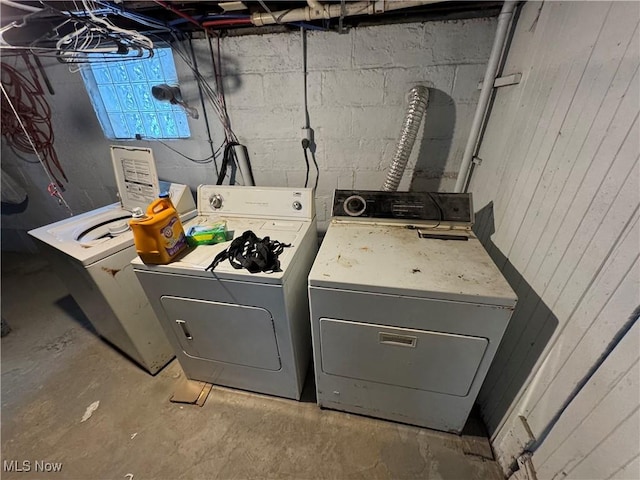 laundry room featuring separate washer and dryer