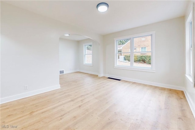 empty room with light wood-type flooring