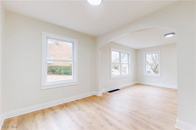 empty room with light wood-type flooring