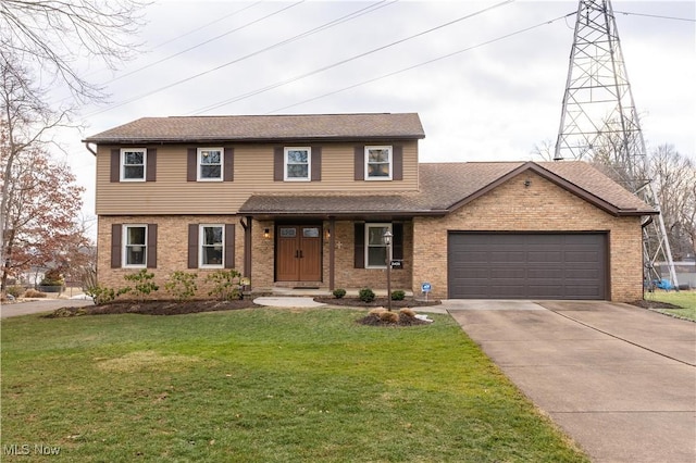 view of front of house with a garage and a front lawn