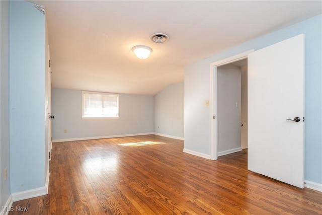 spare room featuring hardwood / wood-style flooring