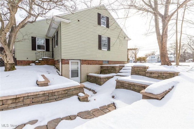 view of snow covered property