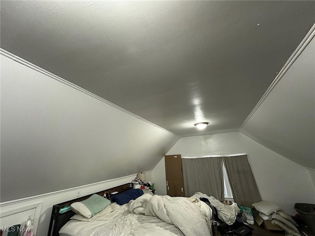 bedroom with vaulted ceiling