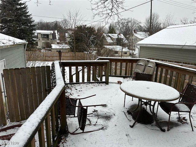 view of snow covered deck