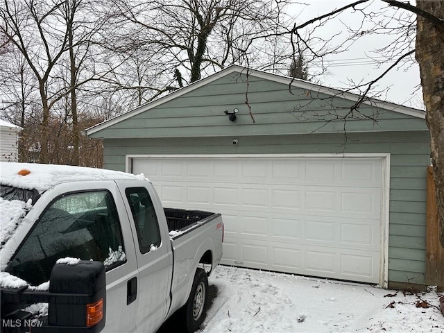 view of snow covered garage