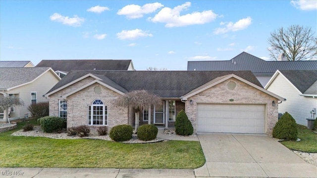 single story home with a garage and a front yard