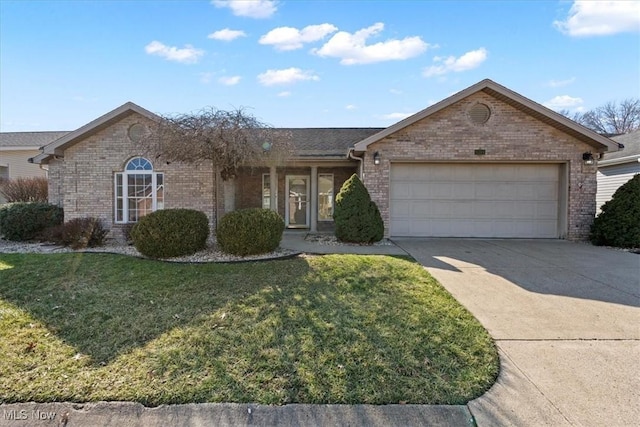 ranch-style house with a garage and a front lawn