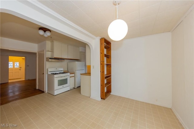 kitchen with white cabinetry, ornamental molding, white appliances, and decorative light fixtures