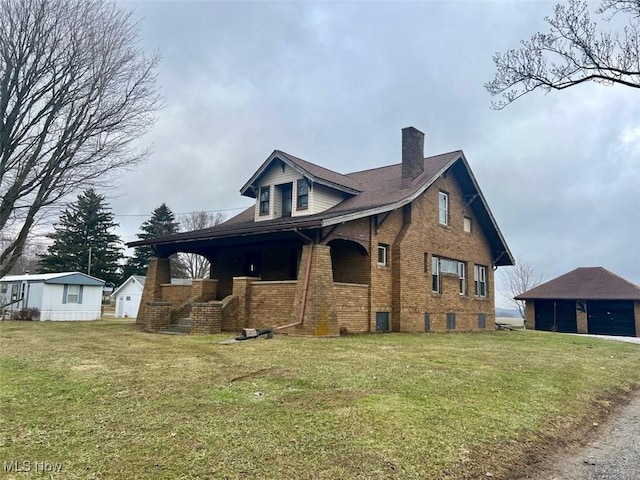 view of home's exterior featuring a porch and a lawn