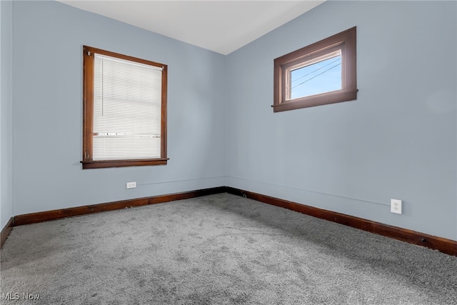 empty room with carpet flooring