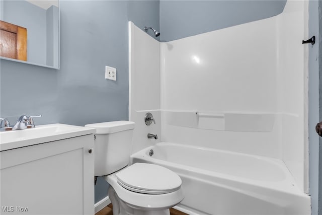 full bathroom with vanity, toilet, and shower / washtub combination