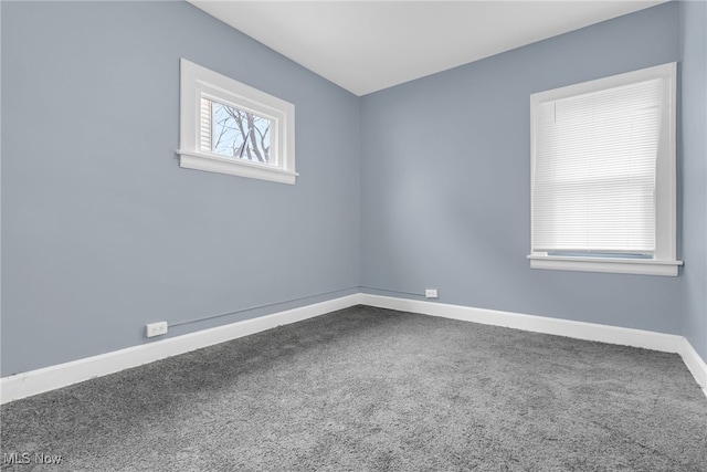 unfurnished room featuring carpet flooring