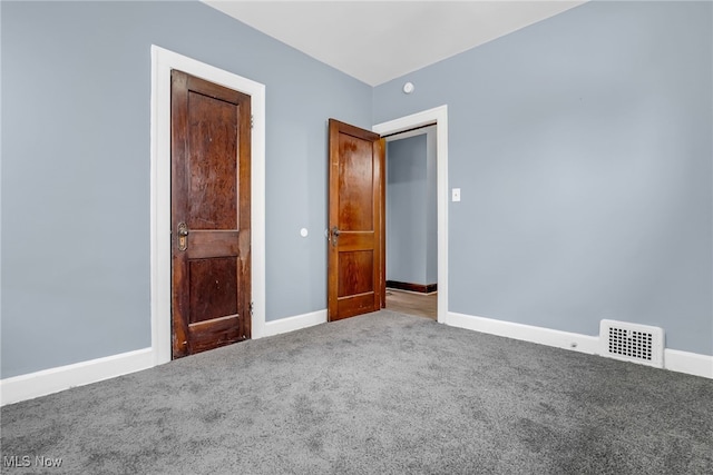 unfurnished bedroom with carpet