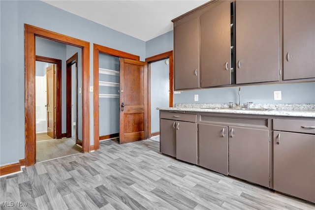 kitchen featuring light hardwood / wood-style floors and sink