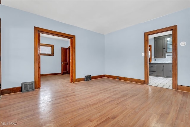 empty room featuring light hardwood / wood-style floors