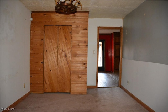 spare room featuring carpet floors