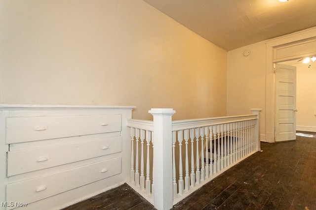 hallway with wood-type flooring