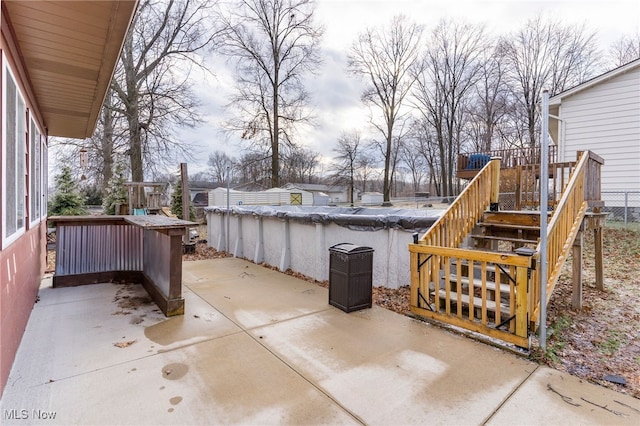 view of patio / terrace with a covered pool